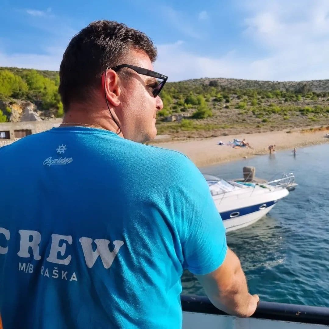 Captain Dražen Baris at the helm of Explorer Baška